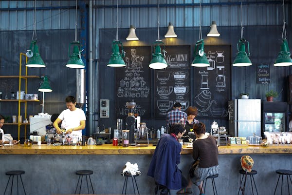 Modern cafe with barista and industrial design